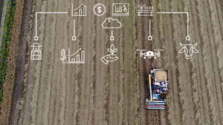 Smart agriculture concept. Aerial view of harvester machine working in field with digital icons representing drone, data analysis, and productivity.の写真素材