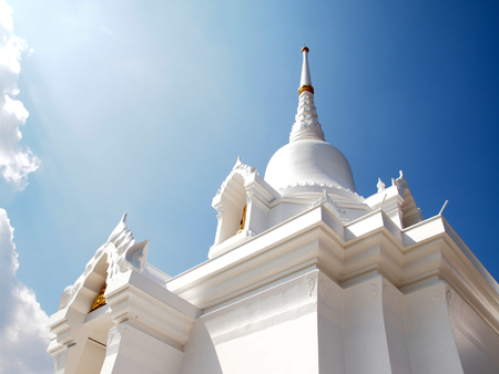 white temple Kanchanapisek Pagoda in Khao Kho District, Phetchabun, Thailand, blue skyの写真素材
