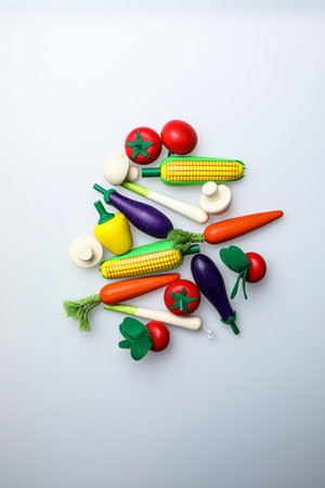 Vegetables in the shape of a Christmas tree on a white backgroundの写真素材