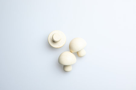 Champignon mushrooms on a white background. Close-up.の写真素材