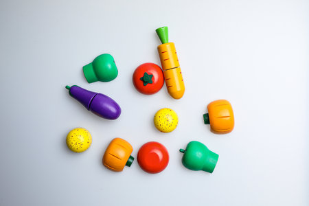 Colorful plastic toys on a white background. Top view.の写真素材