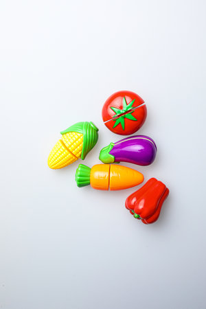 Colorful plastic toys on white background. Top view. Flat lay.の写真素材