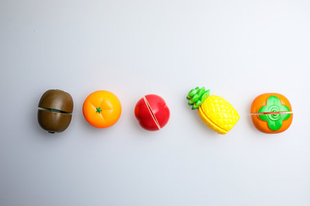 Colorful wooden toys on a white background. Top view. Flat lay.の写真素材