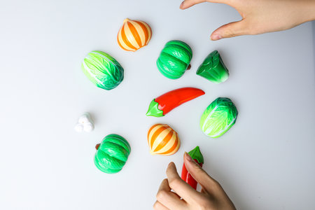 Colorful candies on white background. Top view with copy spaceの写真素材