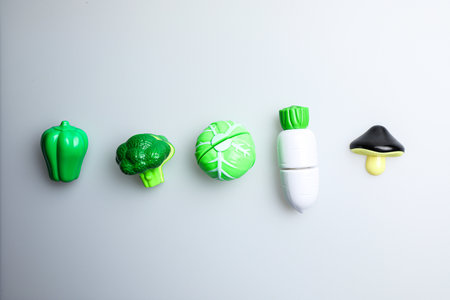 Plasticine vegetables on white background. Minimal creative concept.の写真素材