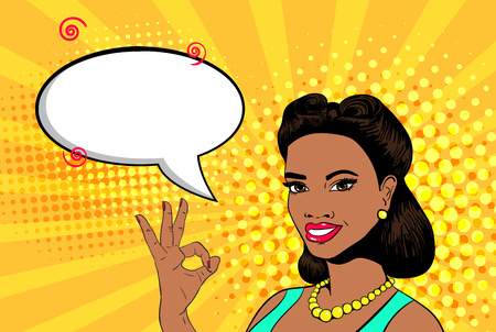 Vector pop art sexy young african woman smiling and showing ok sign. Empty speech bubble. Colorful background in retro comic style.のイラスト素材