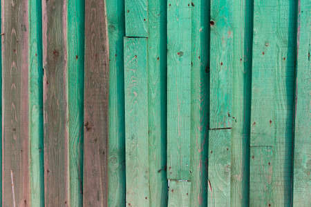 Vintage mint green old wooden planks wall background. Retro style filtered photoの写真素材