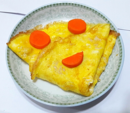 Happy Face Blue Crabmeat Egg Ommlet (Pancake)の写真素材