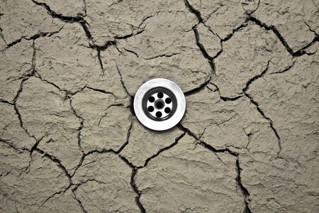 Water drain in dry cranny soilの写真素材
