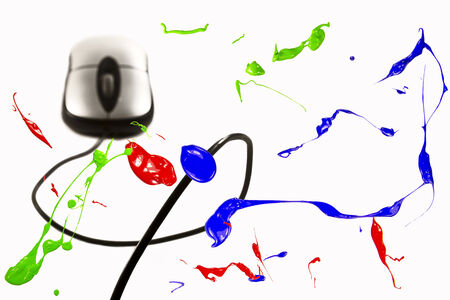 RGB colors on the screen with computer mouse in backgroundの写真素材