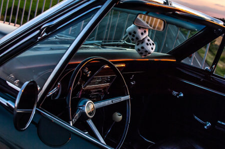 Side view of old american car. Close-up of the steering wheel and dashboard.のeditorial素材