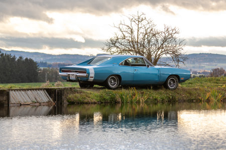 old american car Chevrolet Camaro in the countryside.
