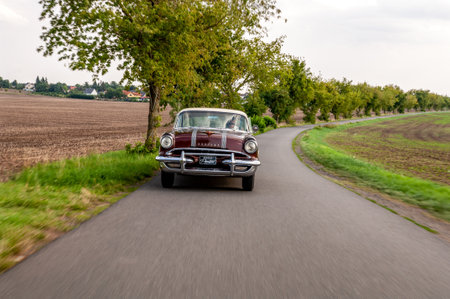 old american car on the roadのeditorial素材