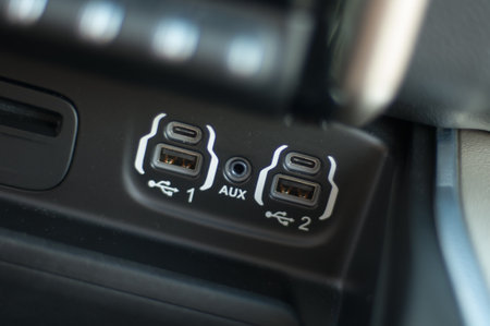 Close up of power supply plugged into a power outlet in a car