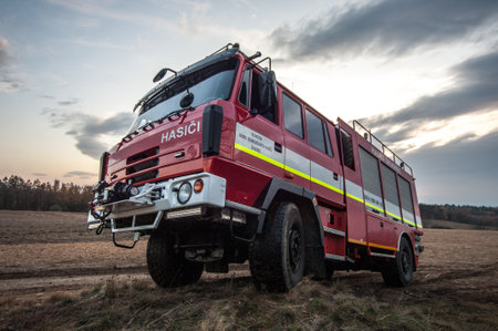 Red fire truck in the field.のeditorial素材