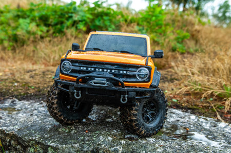 Offroad 4x4 off road vehicle with mud on the ground