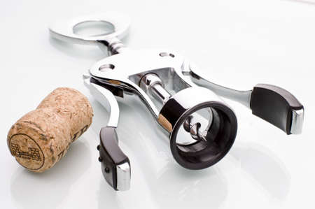 bottle cork  and   mechanical  black - white corkscrew 