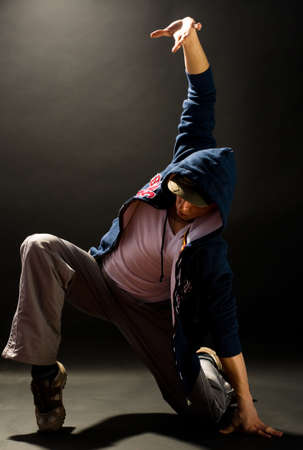 a young nice man dancing modern dances