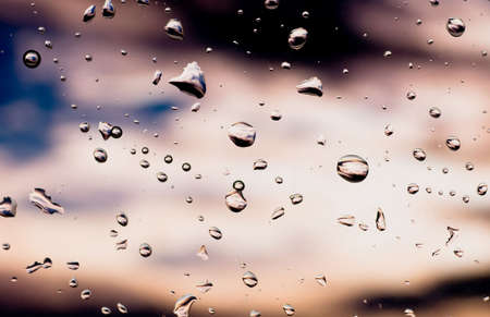 clear drops of water on abstract backgroundの写真素材