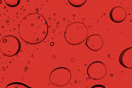 clear drops of blood on abstract backgroundの写真素材
