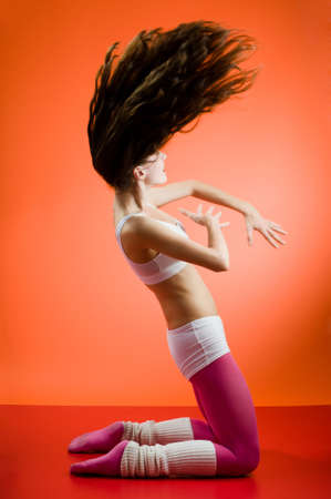 a young nice girl dancing modern dancesの写真素材