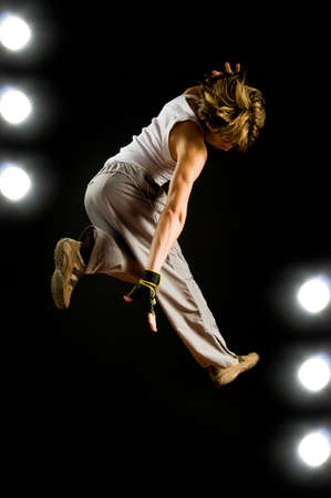 a young nice man dancing modern dances