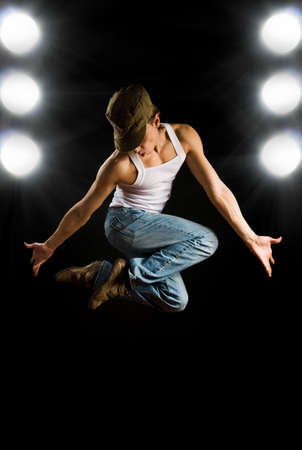 a young nice man dancing modern dances