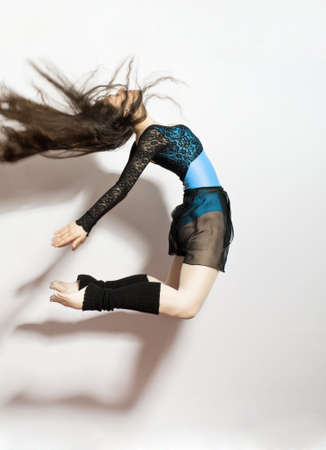 a young nice girl dancing modern dancesの写真素材