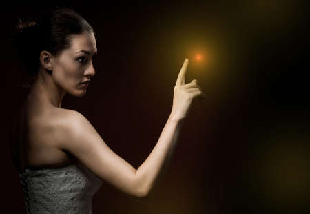 a beautiful calm girl in the darknessの写真素材