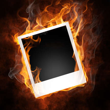 bright flamy symbol on the black backgroundの写真素材