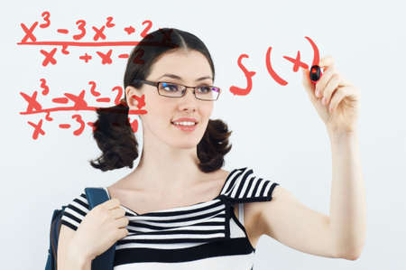 young beautiful girl standing by the board