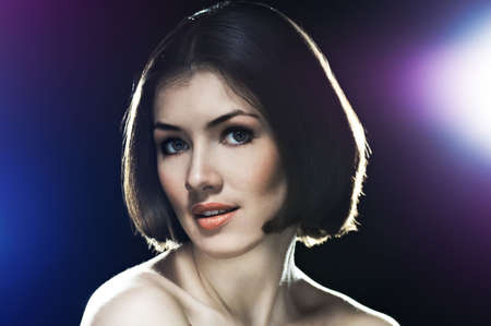a beauty girl on the dark backgroundの写真素材