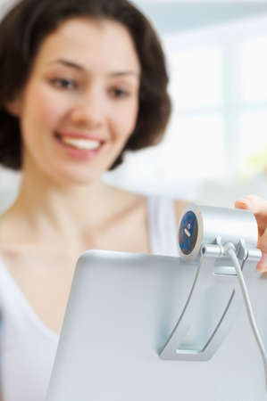 the young woman chatting via the webcam