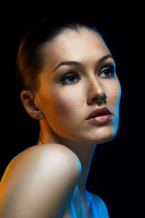 beauty girl on the dark backgroundの写真素材