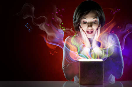 a beauty young girl with christmas giftの写真素材