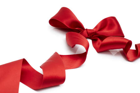 red silk ribbon on the white backgroundの写真素材