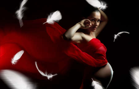 a beauty woman on the dark backgroundの写真素材