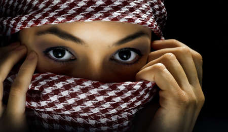 east womanl on the black backgroundの写真素材