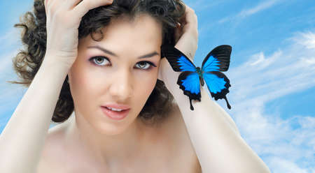 girl and a beautiful butterflyの写真素材