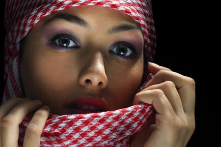 east womanl on the black backgroundの写真素材