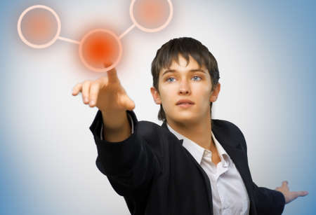 business man clicks on the button