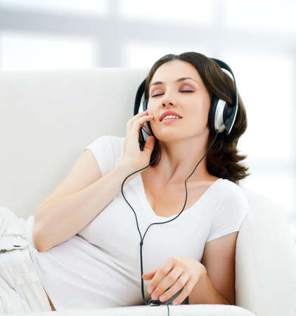 girl with headphones in room girl with headphones in room