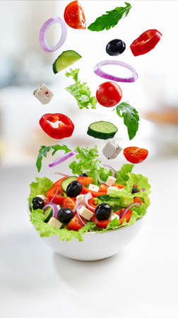 Fresh vegetarian salad on the plateの写真素材