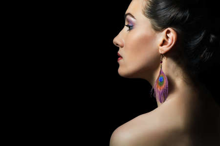 a beauty girl on the dark backgroundの写真素材