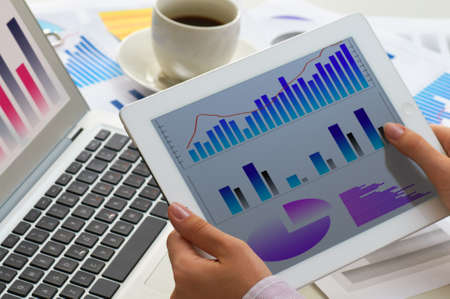 tablet pc on the working tableの写真素材