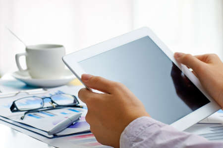 a hands holding a tablet pc