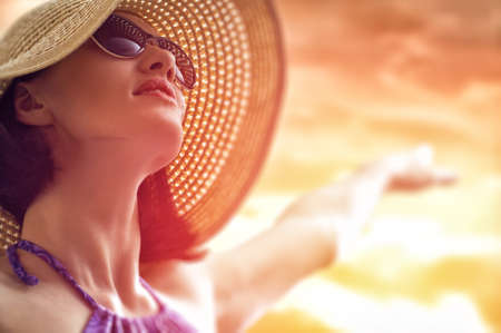 the girl is happy summer sunの写真素材