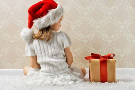 beauty childl with christmas giftの写真素材