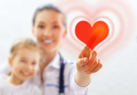 doctor examining a child in a hospitalの写真素材