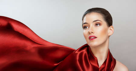 beautiful girl with red scarfの写真素材